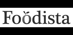 The word Foodista in black serif font, with a stylized accent over the letter o resembling a small leaf, on a white background.