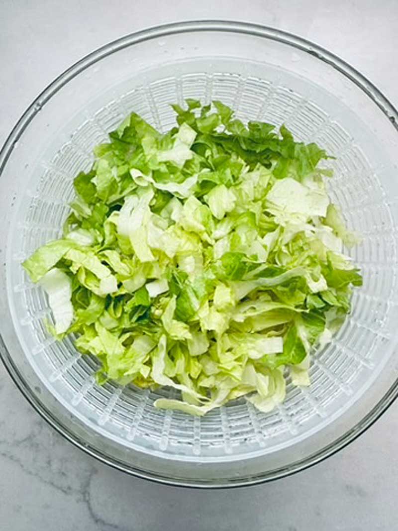Chop, wash, and spin dry Romaine in a salad spinner.