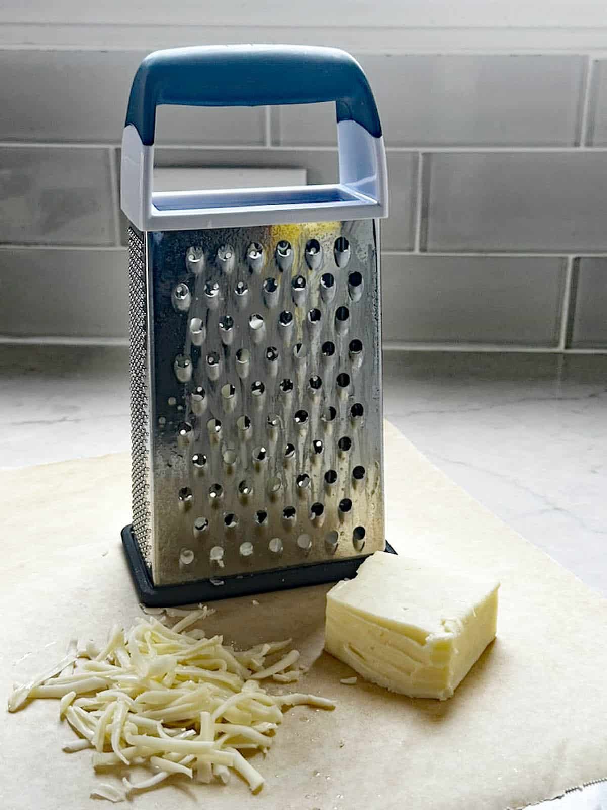 How to Grate Semisoft Cheese on a Box Grater the Easy Way