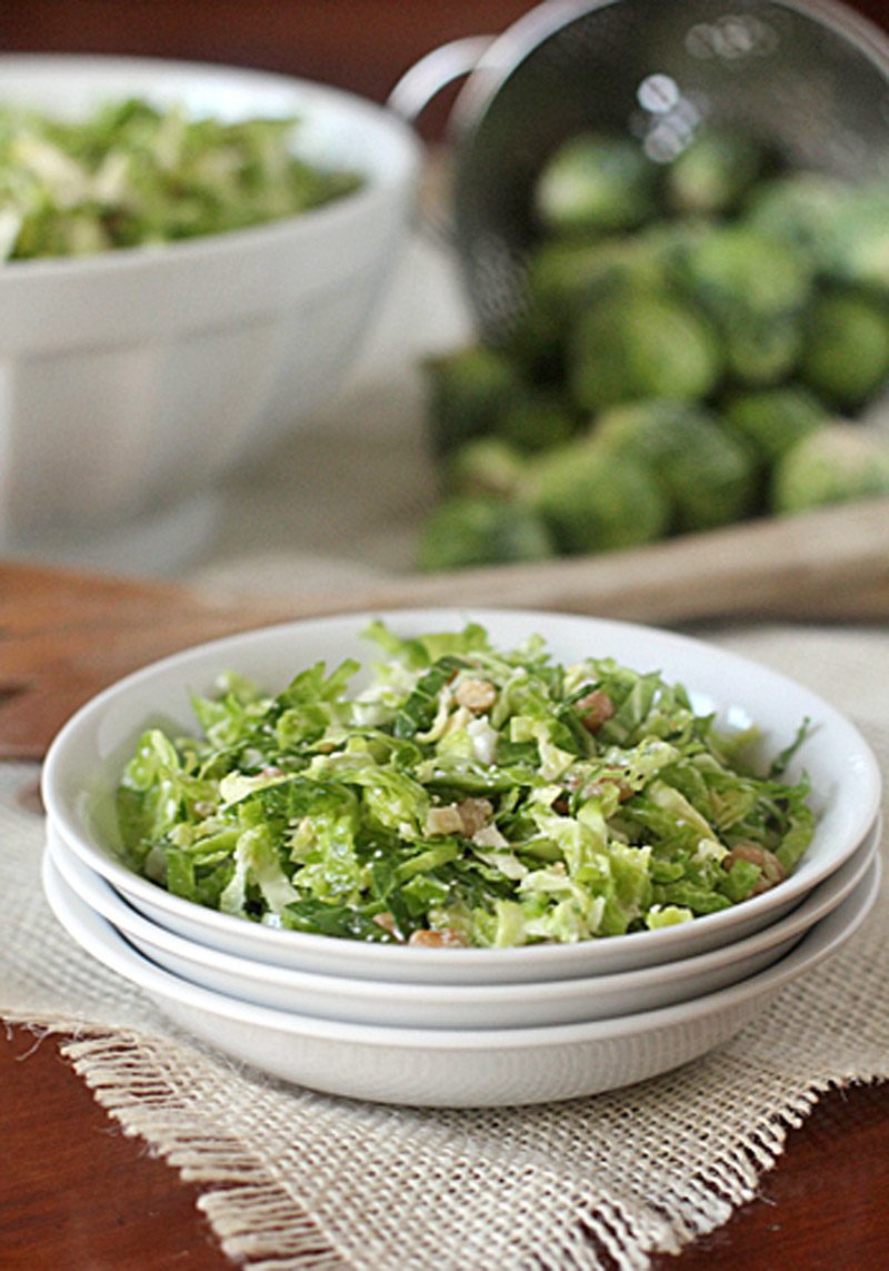 Shaved Brussels Sprout Slaw with Walnuts and Pecorino Romano Cheese
